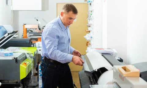 Portrait of male worker at plotter Stock Photos