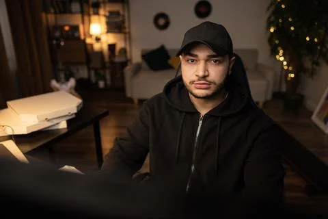 Portrait of a man addicted to computers, working remotely in IT industry Stock Photos