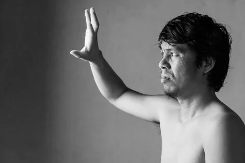 Portrait of man afraid of something on white Stock Photos