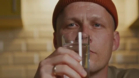 Portrait of man after drinking water showing healthy routine Stock Footage 316580726