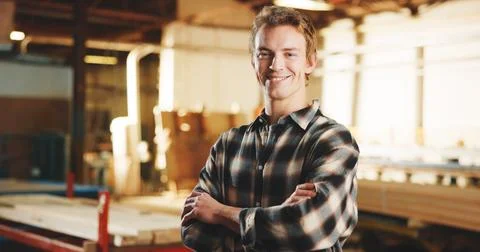 Portrait, man and carpenter in workshop with arms crossed, timber manufactu.. Stock Photos