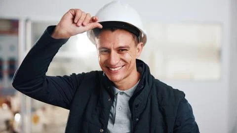 Portrait, man and engineer at site with helmet, protection and project Stock-Fotos