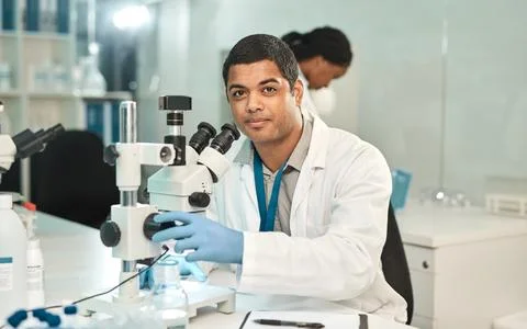 Portrait, man and scientist with microscope in lab for research, studying s.. Stock Photos