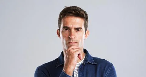 Portrait, man and thinking of solution in studio for problem solving, decision Stock Photos