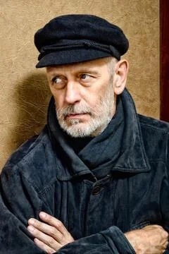 Portrait of a Man with Beard and a Cap Фото