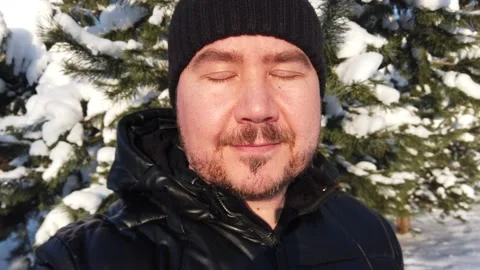 Portrait of a man with a beard in the winter forest. Stock Footage 167604420