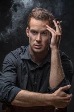 Portrait of man with cigarette 스톡 사진