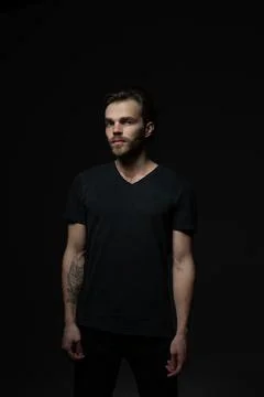 Portrait of a man in a dark key in the studio Foto stock