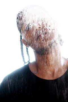 A portrait of a man dissolving into a pixelsort pattern Stock Photos