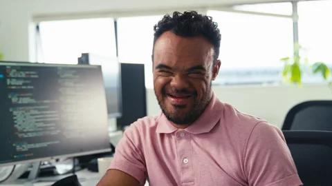 Portrait Of Man With Down Syndrome Working In Office Based Business Training To 스톡 동영상 253051522