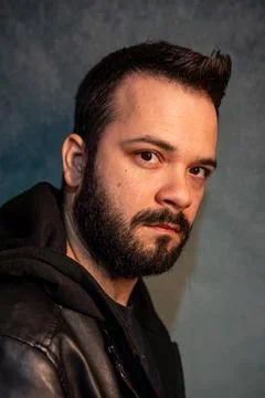 Portrait of a man with dramatic low-key lighting. Stock Photos