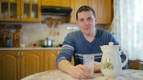 Portrait of a man drinking milk. Video stock 61380849