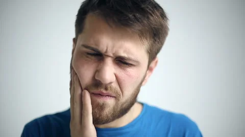 Portrait of a man experiencing toothache. Close up Stock Footage 45170819