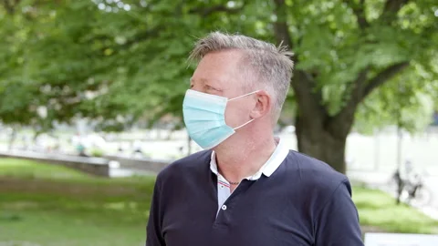 Portrait of a man with face mak during covid-19 pandemic. Stock Footage 131278191