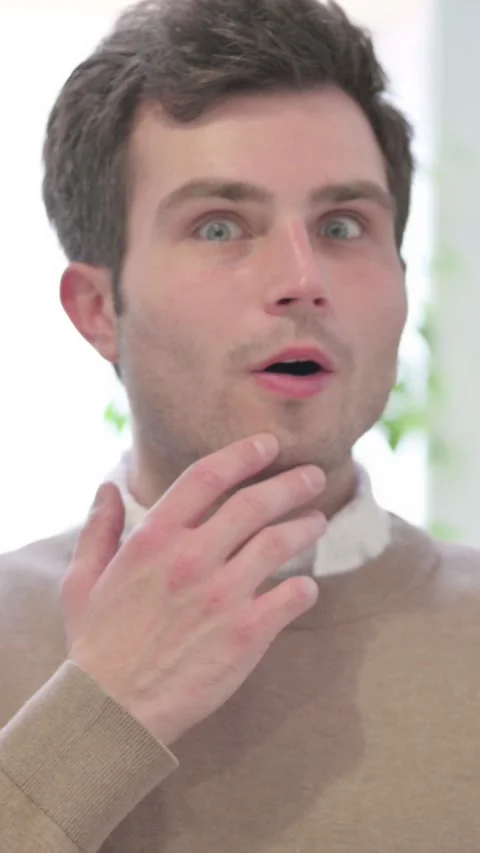 Portrait of Man Feeling Shocked,, Vertical Video Stock Footage 337350898
