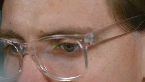Portrait of Man in Glasses Working with Computer Video stock 103530573