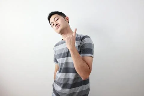 Portrait of a man on grey background. Stockfoto's