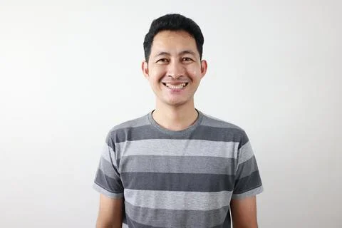 Portrait of a man on grey background. 写真素材