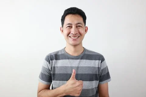 Portrait of a man on grey background. 스톡 사진