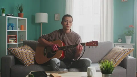 Portrait of Man With Guitar Stock Footage 156748298