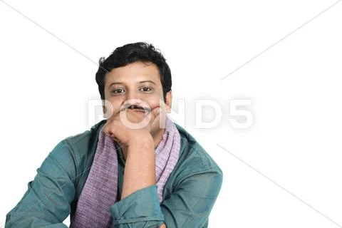Portrait of a man with his hand on his chin Stock Photos