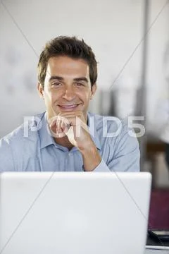 Portrait Of Man With Laptop
