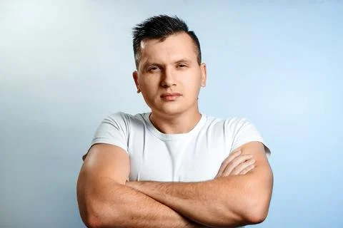 Portrait of a man on a light background close-up. Emotion is the importance,  Stock Photos