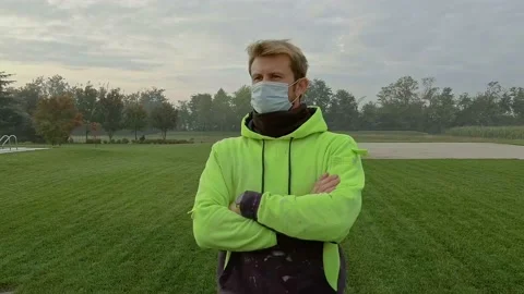 Portrait of Man Looking Around While Wears a Medical Mask During Covid-19 Stock Footage 141921167