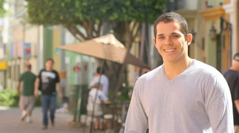 Portrait of a man looking up into the camera and smiling Stock Footage 33892181