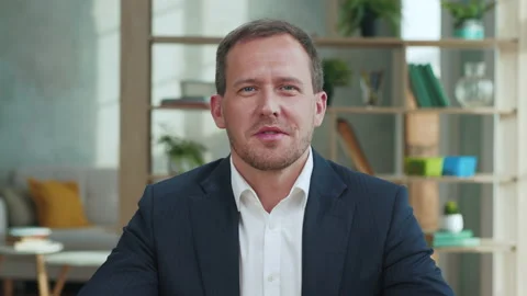 Portrait of Man Looking at Camera and Talking at Video Calling by Work at Home 스톡 동영상 218229104