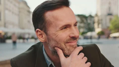 Portrait of man looking at the camera and smiling Stock Footage 227128797
