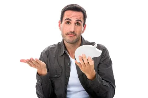 Portrait of a man looking at camera and showing a piggy bank Stock Photos