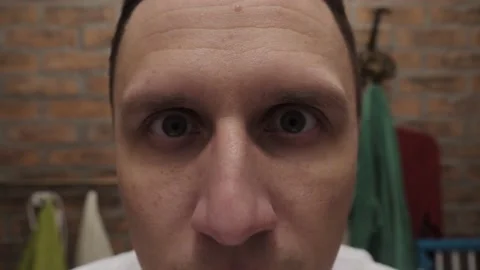 Portrait of a man looking at the camera close up Stock Footage 144519006