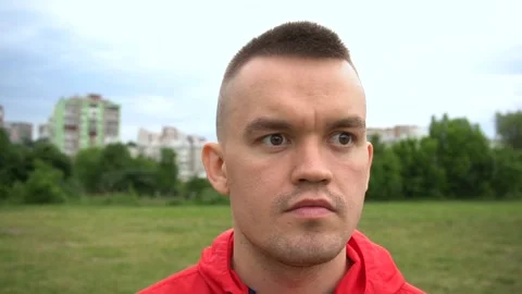 Portrait of man looking at camera face close up outdoors. Stock Footage 90847021