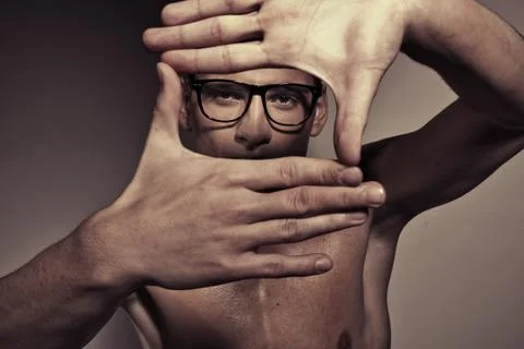 Portrait of man making a square by hands Stock Photos