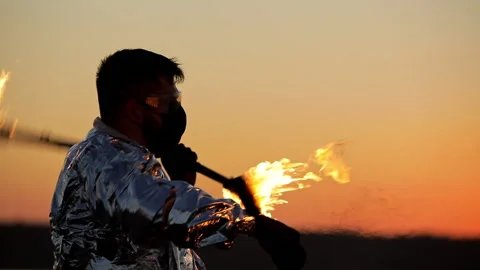 Portrait of a man, a man shows a fire show 動画素材 152258672