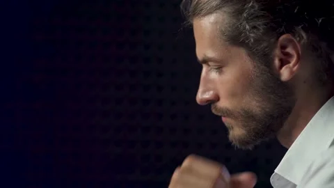Portrait, man playing chess, close-up of a man's face on a dark background Stock Footage 133398720