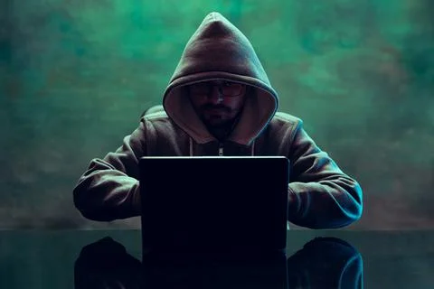 Portrait of man, professional programmer, web hacker breaking security system Stock Photos