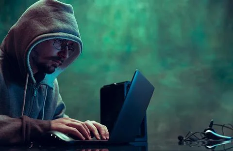 Portrait of man, professional programmer, web hacker breaking security system Stock Photos