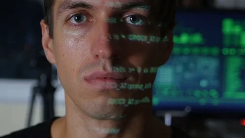 Portrait of Man programmer hacker with green code characters reflect on his face 스톡 동영상 80084865