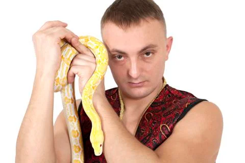 Portrait of man with python snake 写真素材