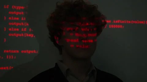 Portrait of Man with Red Cybersecurity Code Projected on Face Stock Footage 347311221