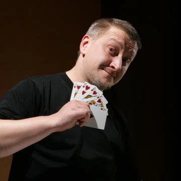 Portrait of the man with royal flush Stock Photos