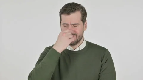 Portrait of Man Smelling something Bad, Odor, White Screen Stock Footage 168207851