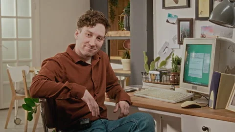Portrait of Man Smiling at Camera after Using Retro Computer Stock Footage 340273854
