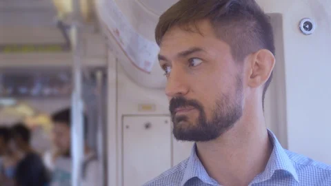Portrait of a man in the subway train Video stock 114695989