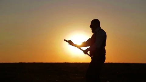 Portrait of a man with a sword at sunset, the path of a warrior. Stock Footage 79606400