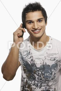 Portrait of a man talking on a mobile phone Stock Photos