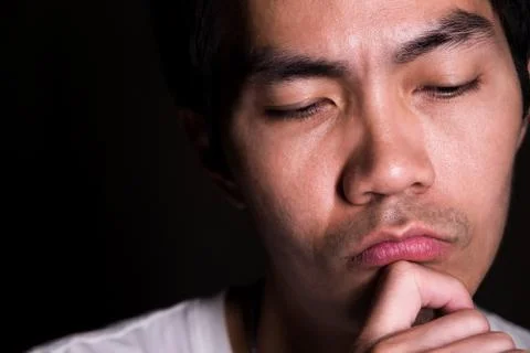 A portrait of a man is thinking about his work. Stock Photos