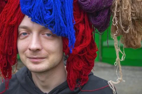 Portrait man with threads, woolen yarn Stock Photos